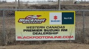 Calgary signs - fence mounted